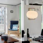 Ein Raum mit Sitzgelegenheit und Tisch. Neben einem Essbereich mit Lampe und Flasche.