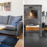 Grauer Sofa mit Kissen und Tisch. Holzofen mit Feuer und Werkzeug.