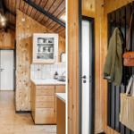 Holzgetäfeltes Interieur mit Küche und Garderobe. Helle Arbeitsfläche und schwarze Metallstangen.