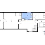 Erdgeschossplan mit Wohnbereich, zwei Schlafzimmern und Bad.