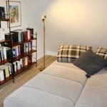 Couch ausgeklappt, als Aufbettung für weitere Personen