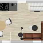 Küche mit Essbereich und Wohnzimmer mit Sofa und TV.