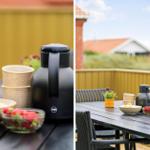 Terrasse mit Tisch, Stühlen, Obst und Thermoflasche.