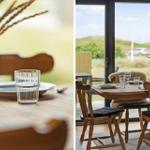 Esstisch mit Stühlen und Blick auf die Landschaft.