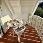 überdachter Westbalkon