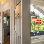 Eingangsbereich mit weißen Wänden und Flaggen an Fenster