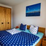 das Schlafzimmer mit Doppelbett