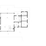 Grundriss einer Wohnung mit Küche, Bad und Schlafzimmer.