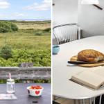 Terrasse mit Blick auf Grasland und Meer. Esszimmertisch mit Brot, Buch und Blumen.