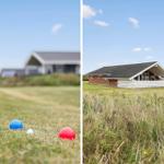 Rote, blaue und gelbe Bälle liegen auf einem Grasfeld vor einem Haus.