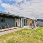 Moderne Ferienwohnung mit Terrasse, Grill und Garten.