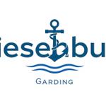 Friesenbude Garding mit Anker und Wellenmotiv