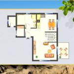 Erdgeschossplan mit Küche, Bad, Schlafzimmer und Wohnzimmer mit Couch und Tisch.