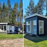 Zwei schwarze Häuser mit weißen Fenstern und Terrassen im Wald.