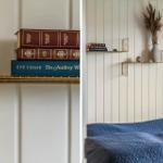 Schlafzimmer mit blauer Bettdecke, goldener Wandregal und Bücherstapel.