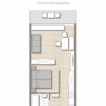 Wohnung mit Schlafzimmer, Küche und Bad. Terrasse mit Sitzgelegenheit.