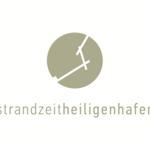 Logo mit stilisiertem Kreis und Text strandzeitheiligenhafen