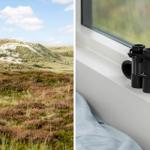 Dünenlandschaft mit Fernglas am Fenster