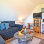 Wohnlandschaft mit Flat-TV