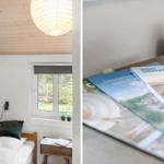 Schlafzimmer mit Bett, Fenster und Lampe. Tisch mit Reiseführern.