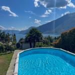 Pool with view of lake and mountains
