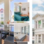 Wohnung mit Balkon, Wohnzimmer, Schlafzimmer und historischem Gebäude