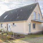 Ferienwohnung mit Balkon, Garten und Terrasse. Modernes Haus mit Dachterrasse.