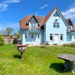 Südseite des Hauses mit Grundstück
