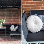 Terrassenbereich mit Sitzbank, Tisch und Kissen vor Backsteinwand.