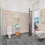 Bathroom with shower, toilet, sink, and bathtub.