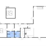 Geschossplan zeigt Wohnbereich, Küche und Schlafzimmer mit Bad.