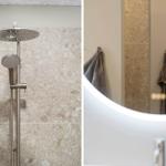 Duschkopf und Handbrause an Terrazzowand. Spiegel mit Handtüchern und Waschbecken.