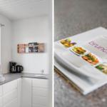 Kitchen with window and coffee machine. Right: cookbook with brunch recipes.
