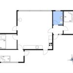 Two bedrooms, kitchen, bathroom, and living area with compass.