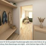 Eingangsbereich mit Garderobe, Sitzbank und Blick in Wohnzimmer mit Sofa und Fenster.