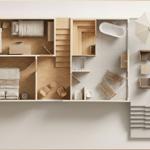 Drei Schlafzimmer, Bad, Sauna und Terrasse mit Sonnenschirm.