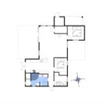 This apartment has a sauna, kitchen, and three bedrooms with beds.