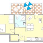Wohnung mit Küche, Essbereich, Schlafzimmer und Bad. Außenbereich mit Sonnenschirm.