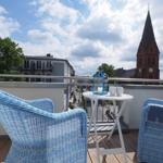 Balkon mit Gartenmöbeln
