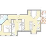 Wohnung mit Schlafzimmer, Küche, Bad und Terrasse mit Sonnenschirm.