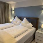 Modernes Elektro-Boxspringbett (180x200cm) mit höhenverstellbaren Kopf- und Fußelementen - für Ihren Schlafkomfort!