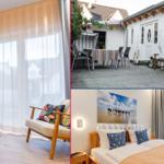 Wohnzimmer mit Sofa, Sessel und großem Fenster. Außenbereich mit Tisch und Bank. Schlafzimmer mit Bett und Wandbild.