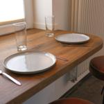 Window seat: Compact table right next to the kitchenette