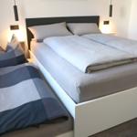 Variable double bed with pull-out extra bed for one child