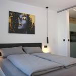 Bedroom with sliding door to the kitchen