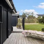 Deck with lounge chair and view of the garden