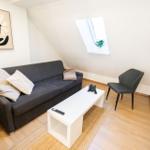 Schlafzimmer 1 der Ferienwohnung Bergmoment in Blankenburg Harz mit 180 cm Boxspringbett und 160 cm Klappcouch.