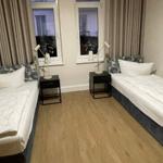 Schlafzimmer mit zwei Einzelbetten