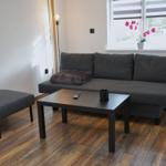 Wohnbereich mit ausklappbarer Couch