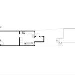 Floor plan shows kitchen, bathroom, and stairwell leading to upper level.